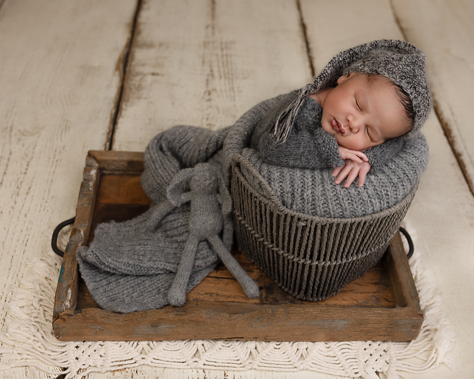 Sleeping newborn baby captured by a certified photographer in Slough